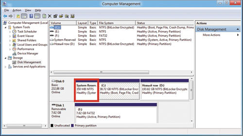 Диспетчер дисков (красным цветом выделен служебный раздел)