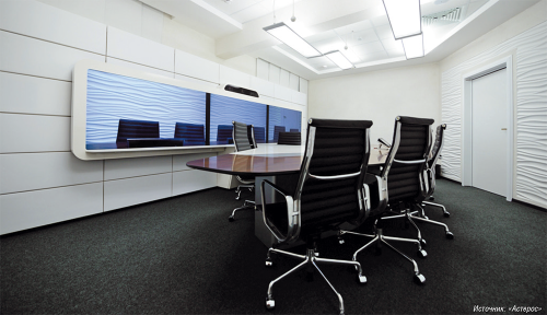 Рис. 4. Развернутая в московском офисе компании «СИБУР» переговорная телеприсутствия, где установлена система Polycom RealPresence OTX с «эффектом погружения», сейчас используется для взаимодействия с зарубежными партнерами. Но уже в 2016 году «СИБУР» планирует организовать еще две комнаты телеприсутствия на своих производственных площадках в России