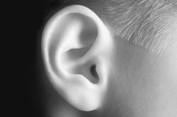 Кохлеарные имплантаты